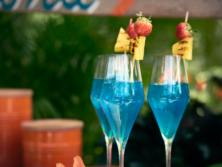 Blue Hawaiian Cocktail with Grilled Pineapple 